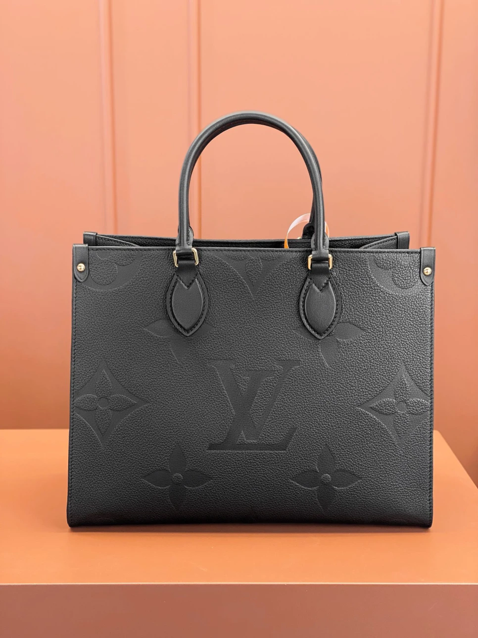 louis-vuitton-lv-monogram-empreinte-leather-onthego-mm thumbnail 7