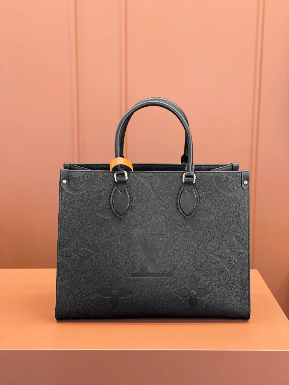 louis-vuitton-lv-monogram-empreinte-leather-onthego-mm thumbnail 4