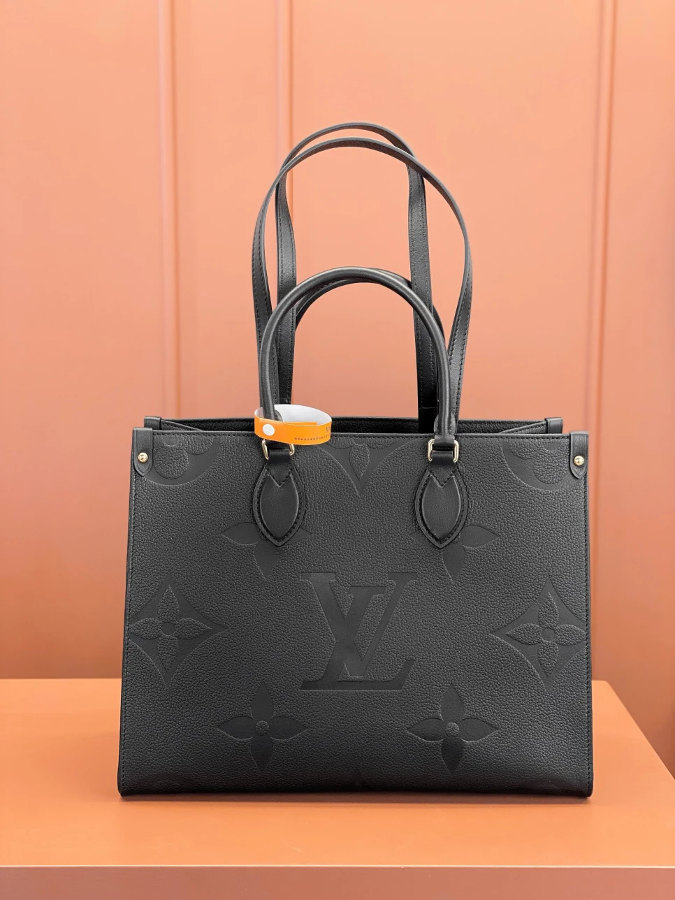 louis-vuitton-lv-monogram-empreinte-leather-onthego-mm thumbnail 6